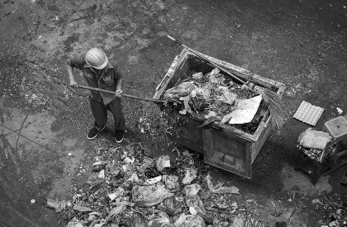 Construction site with builders waste being cleared