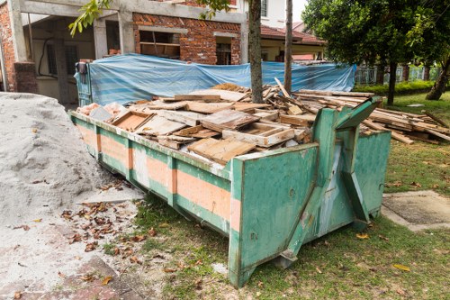 Waste disposal trucks in Mill Hill